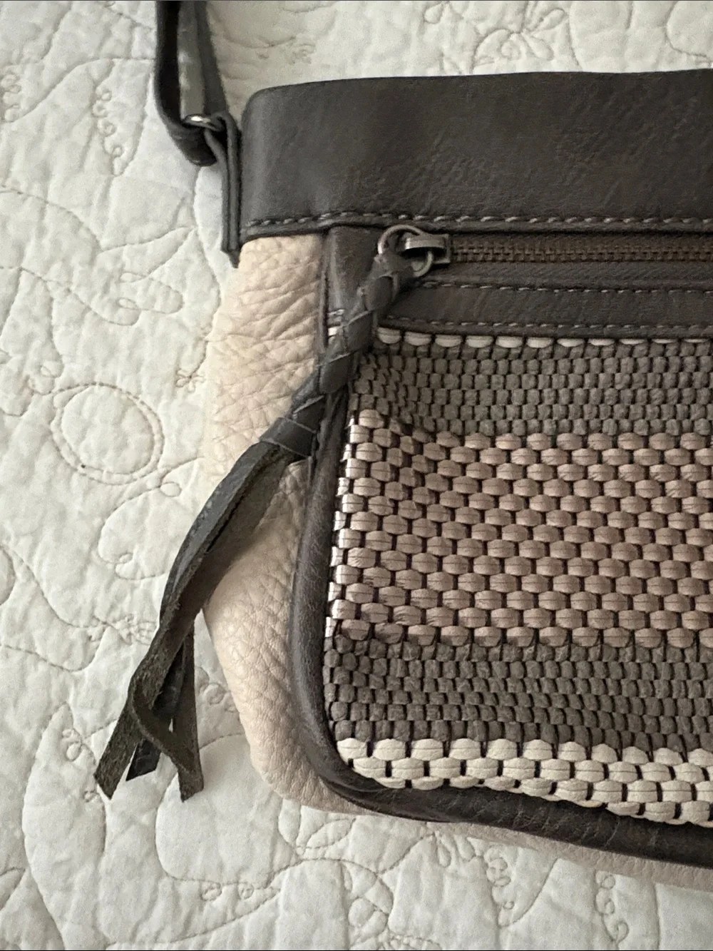 The Sak Leather Messenger Bag in Black and Cream Woven Front